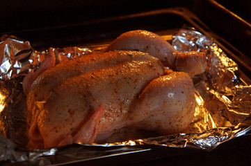 ruddy raw chicken in the oven bake