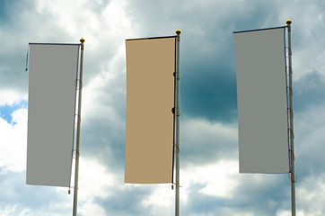 Flag sign on the sky background empty banner information