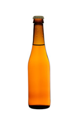 the light beer poured in a bottle from dark glass, isolated on a white background