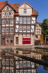 Obraz premium Half timbered houses reflected in the water in Hann. Munden, Germany