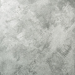 Textured background. Decorative plaster walls, external decoration of facade. Texture of silver.