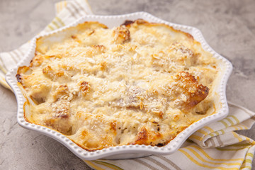 White fish casserole with cheese, sour cream