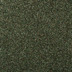 Textured background. Decorative plaster walls, exterior decoration of the facade. Texture color green.