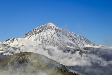 Teide volcano with snow in a clear day