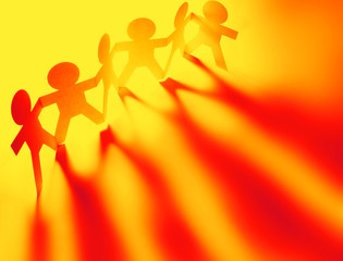 Paper chain team holding hands