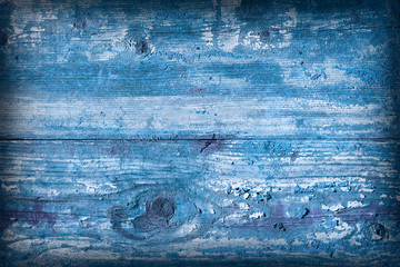 Old wooden texture as background. Blue color.