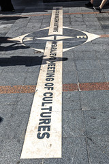 Fototapeta premium West and East Meeting of Cultures sign at Ferhadija Street in Sarajevo, Bosnia and Herzegovina.