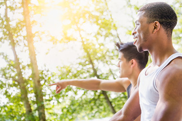 Happy African American Man Talking With Mixed Race Man Outdoors