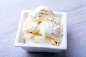 Mascarpone in bowl. ingredient for homemade tiramisu cake in close up.
