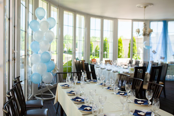 Tables decorated for baby's birthday