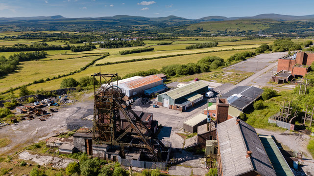 Aerial drone view of a closed, abandoned coal mine (Tower Colliery, South Wales)