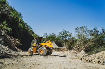 Road work with shovel loader in La Farola after landslide