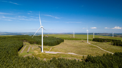 Aerial drone view of a huge wind farm at Pen y Cymoedd in South Wales, UK