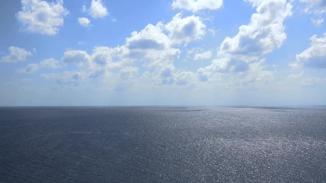 Aerial view of endless ocean or open sea with clouds - Red Sea