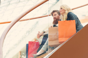 Couple with shopping bags