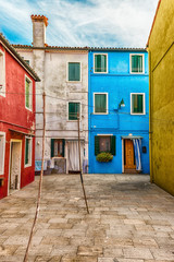 Fototapeta na wymiar Colorful painted houses on the island of Burano, Venice, Italy