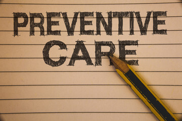 Writing note showing  Preventive Care. Business photo showcasing Health Prevention Diagnosis Tests Medical Consultation Ideas concepts on old beige notebook paper pen resting black letters.