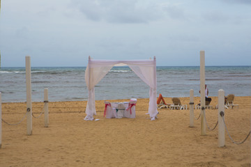 Detail of wedding gazebo on a tropical sand beach