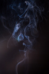 Smoke on a black background.