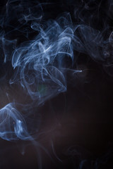 Smoke on a black background.