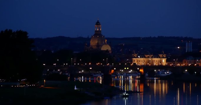 Blue hour night skyline in Dresden, with view over the historic old town and Carola Bridge. (Saxony, Germany)