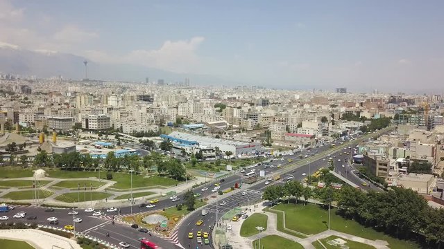 Aerial drone view of roads near the  Azadi tower in Tehran.  Iran 2018, may. A monument located at Azadi Square. 