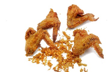 Top view group fried chicken wings drumstick with onions fried isolated on white background. Space for text in template. 