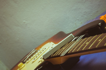 electric guitar on guitar repair desk