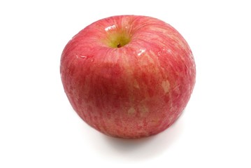 Top view of drops with  red apple  isolated on white background.