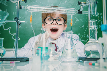 surprised boy scientist
