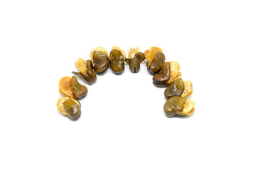 Baked salted broad beans isolated on white background