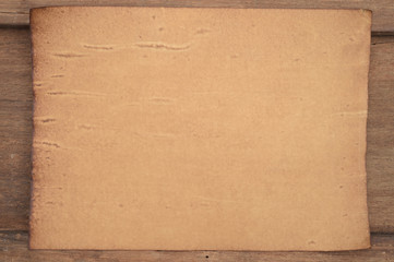 old paper texture on wooden background