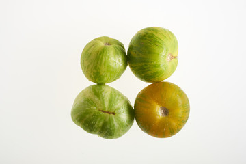 Fresh tomatoes on white