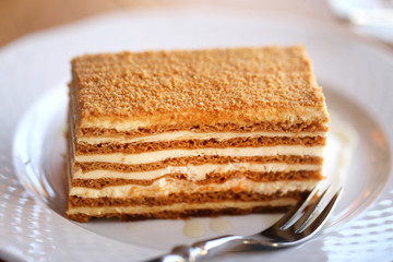Photo of a delicious macro cake with honey