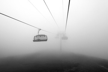 Photo booths on a cable car among mountains