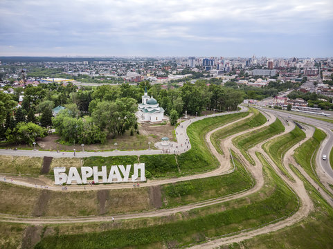 Barnaul, Russia. Description of Barnaul at the entrance to the city. Highland Park and a new embankment is the top view in summer.