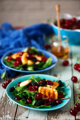 Grilled halumi  cheese salad with berries.