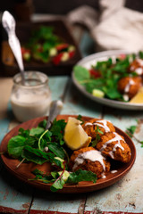  Beet falafel with tahina sauce and green salad