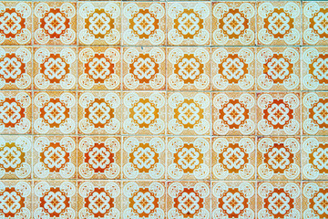 Detail of the traditional tiles from facade of old house