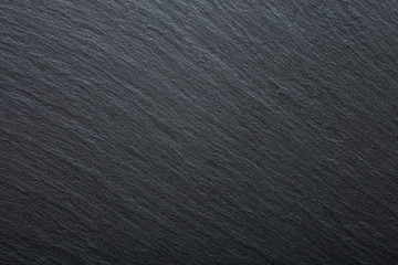 Naklejka premium Dark grey and black slate granite background. Texture background for your project.