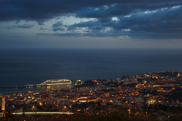 After sunset panoramic view to Funchal with atlantic ocean and cruise ship, Madeira