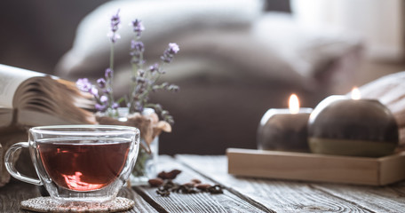 a cup of tea with a book in the interior