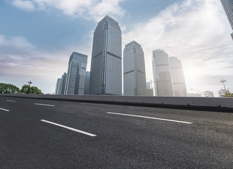 Air highway asphalt road and office building of commercial building in modern city