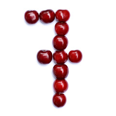 Number seven. A figure composed of cherries isolated on a white background.