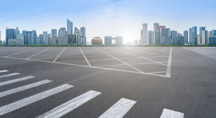 empty road with panoramic cityscape