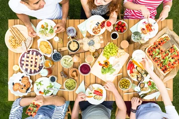 Keuken spatwand met foto Top view on table with healthy food during meeting of friends © Photographee.eu