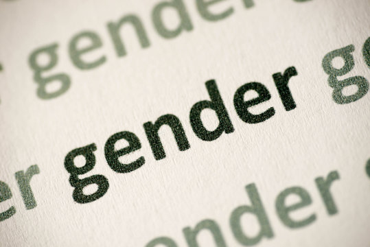 word gender printed on paper macro