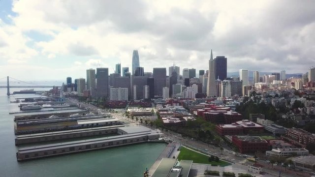 Aerial cityscape flythrough video of San Francisco skyline - Pullback Reveal Shot