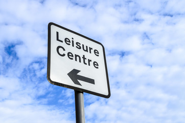 A signpost pointing the way to the leisure cectre, UK