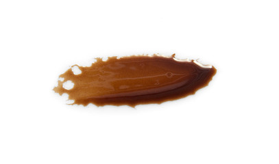 Abstraction. Smear of chocolate sauce, isolated on white